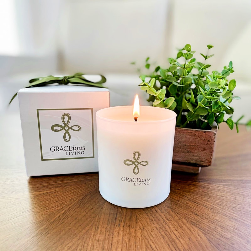 Our private label GRACEiousliving soy candle featuring crisp lemongrass and ylang ylang fragrance